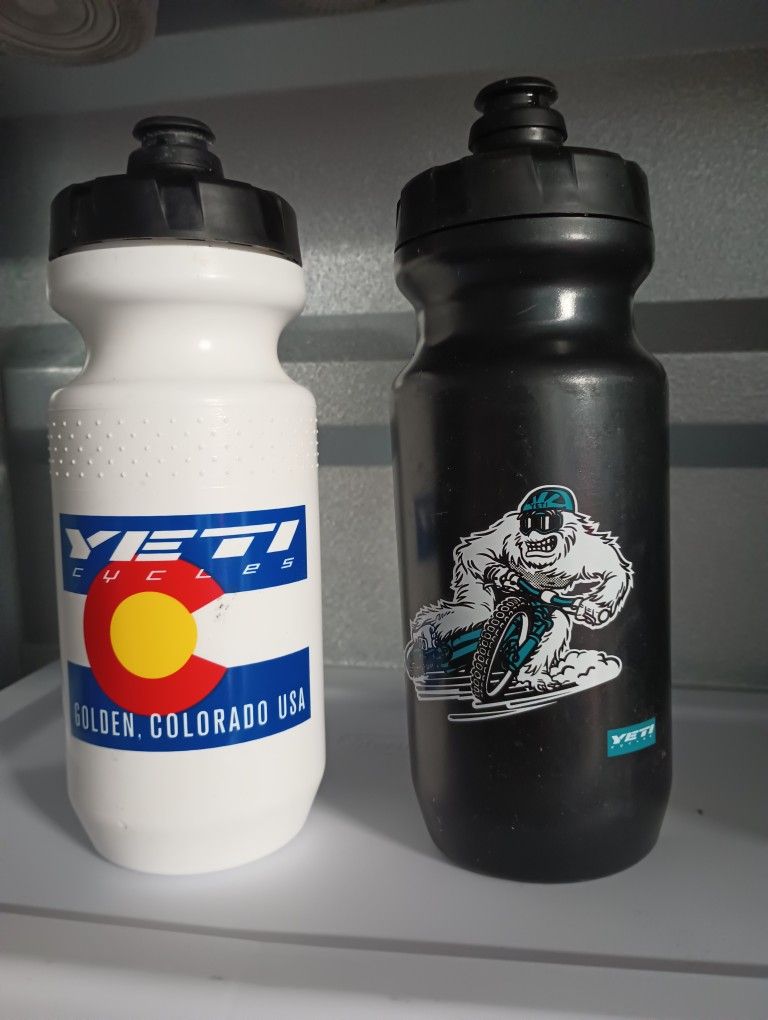 2 Yeti Cycling Water Bottle Colorado Flag and Sliding Yetiman 21 oz.. .