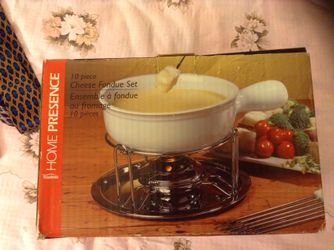 New in box, 10 piece cheese fondue set