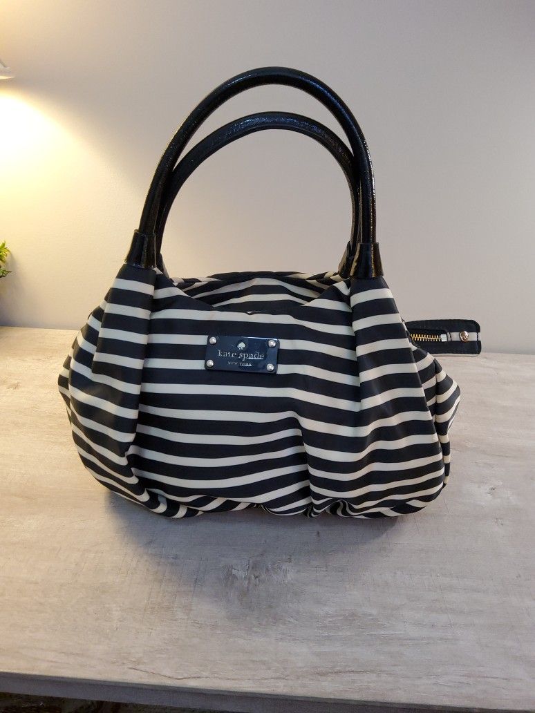 A Beautiful Kate  Spade .     Size  .  18"×  12" .     
