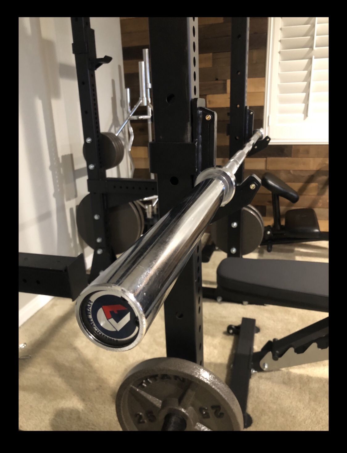 Brand new Titan Fitness 7’ foot 45 lb Olympic weight bar barbell (not negotiable)