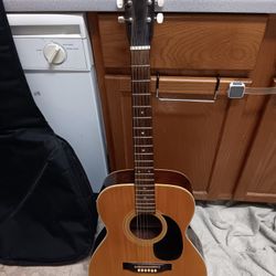 Carlos acoustic guitar.