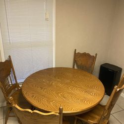 Solid Wood Table And Four Chairs 