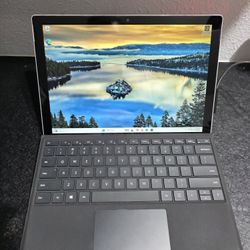 TWO SURFACE PROS WINDOWS 11