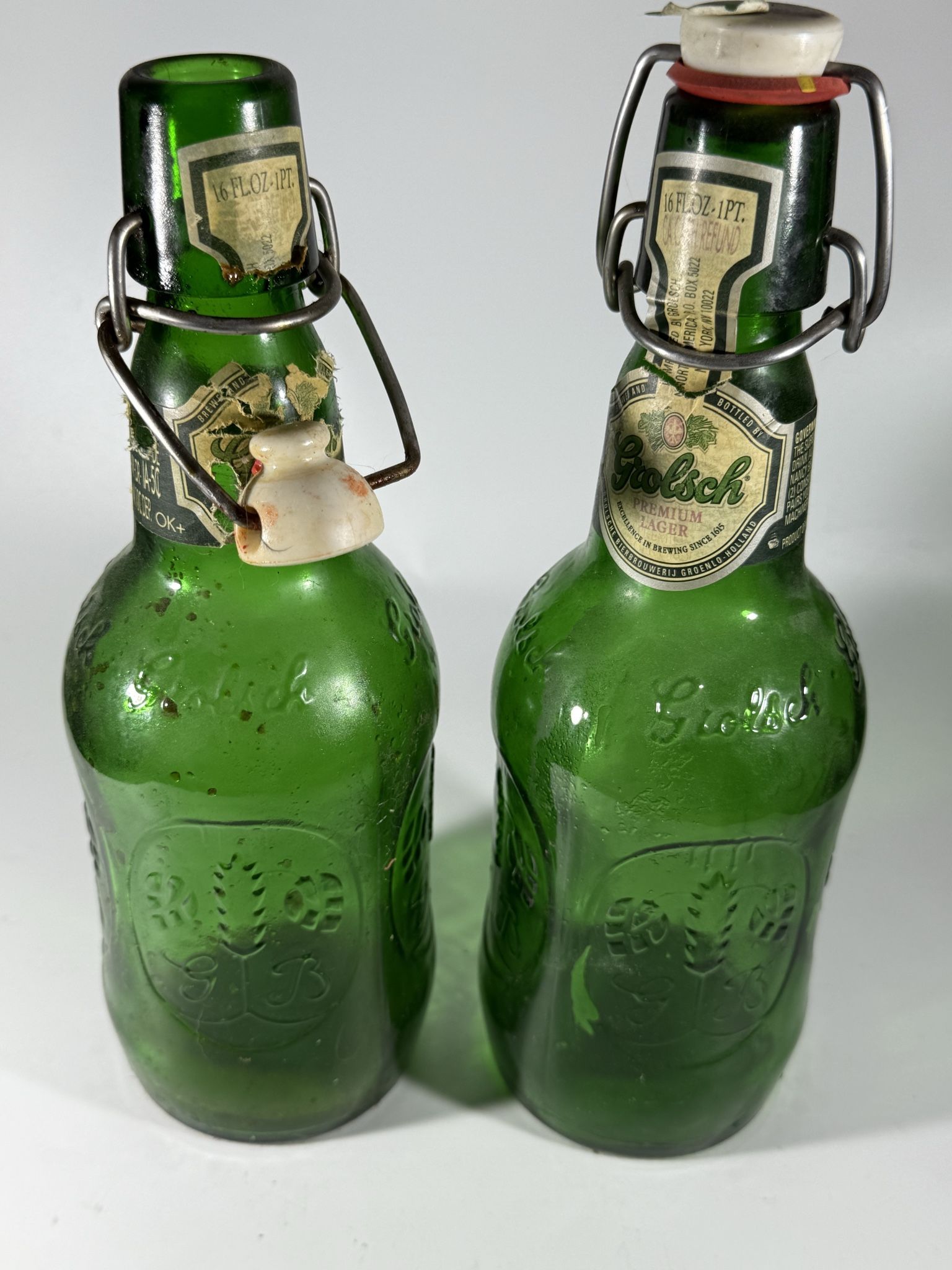 2 Vintage empty Grolsch beer bottles with porcelain caps