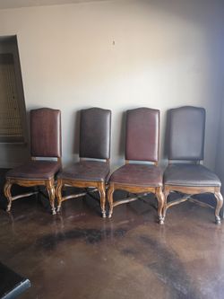 Dining Table and 4 high back leather
