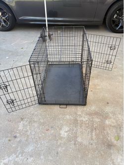 and great shape Dog cage 3 ft long 2 ft wide 26” tall and great shape