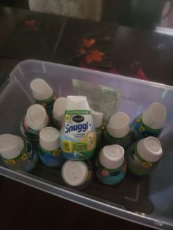 Small bottles of snuggle fabric softener