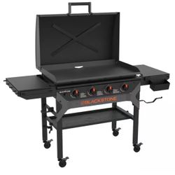 Blackstone 4-Burner Liquid Propane Outdoor Griddle with Hood in Black