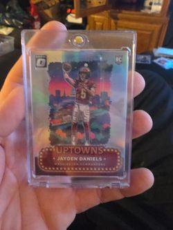 Jayden Daniels UPTOWN rookie card.