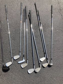 Assorted left handed golf clubs