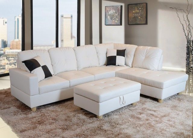 New White Leather Sectional And Ottoman 