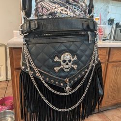 Skull and fringe leather crossbody bag