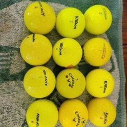 One dozen yellow golf balls nice shape