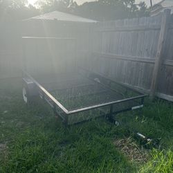 Lowe’s black metal trailer 5x8