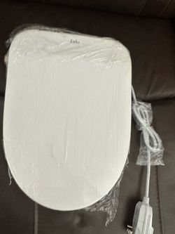 Electric bidet toilet seat.