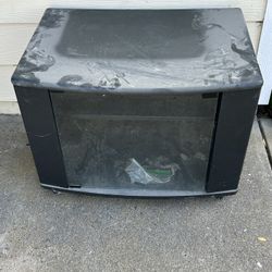 Free TV Stand /cabinet. Rolling… Works Well