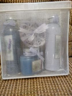 Lavender Bubble Bath, Body Lotion, Body Scrub, and Little Purple Flower Pedals.