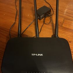 MODEM ARRIS . And TP  Router.$50