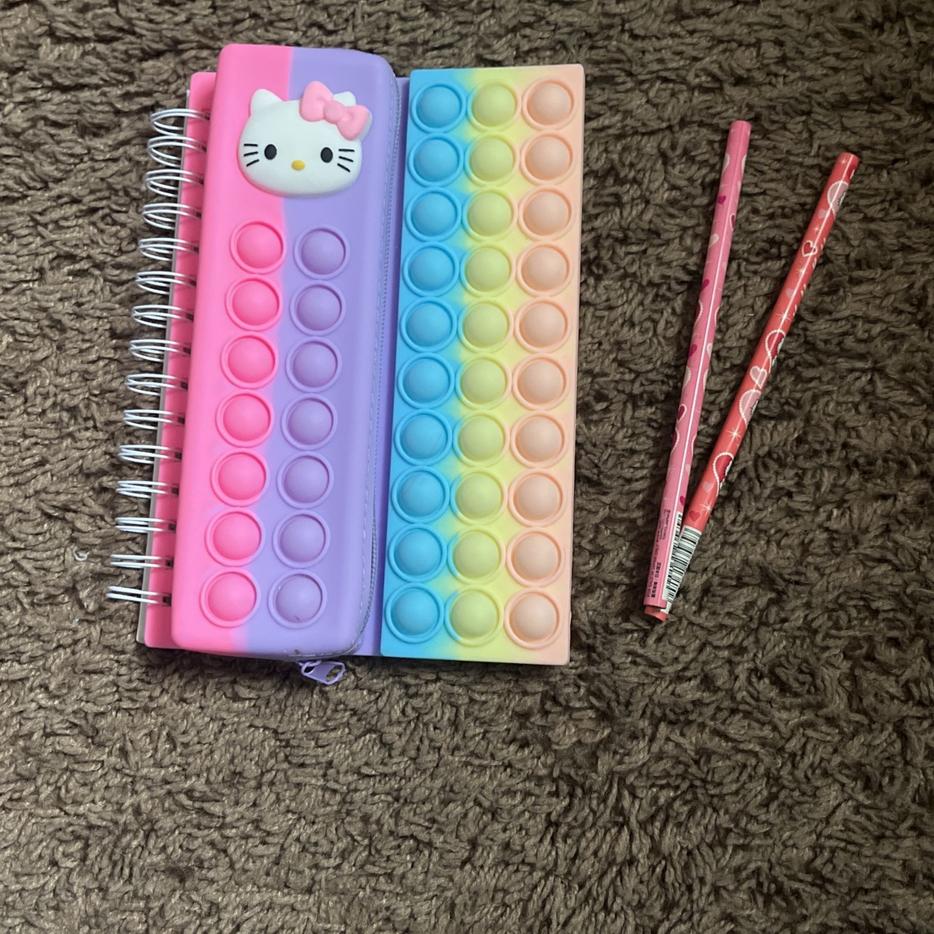 Hello Kitty pop it notebook