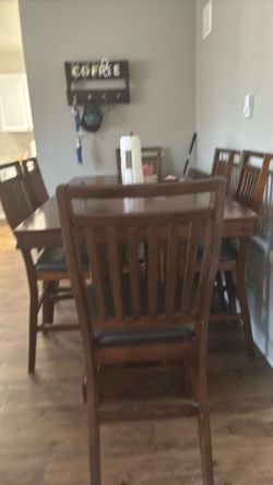 Dinner table  and 6 chairs for free