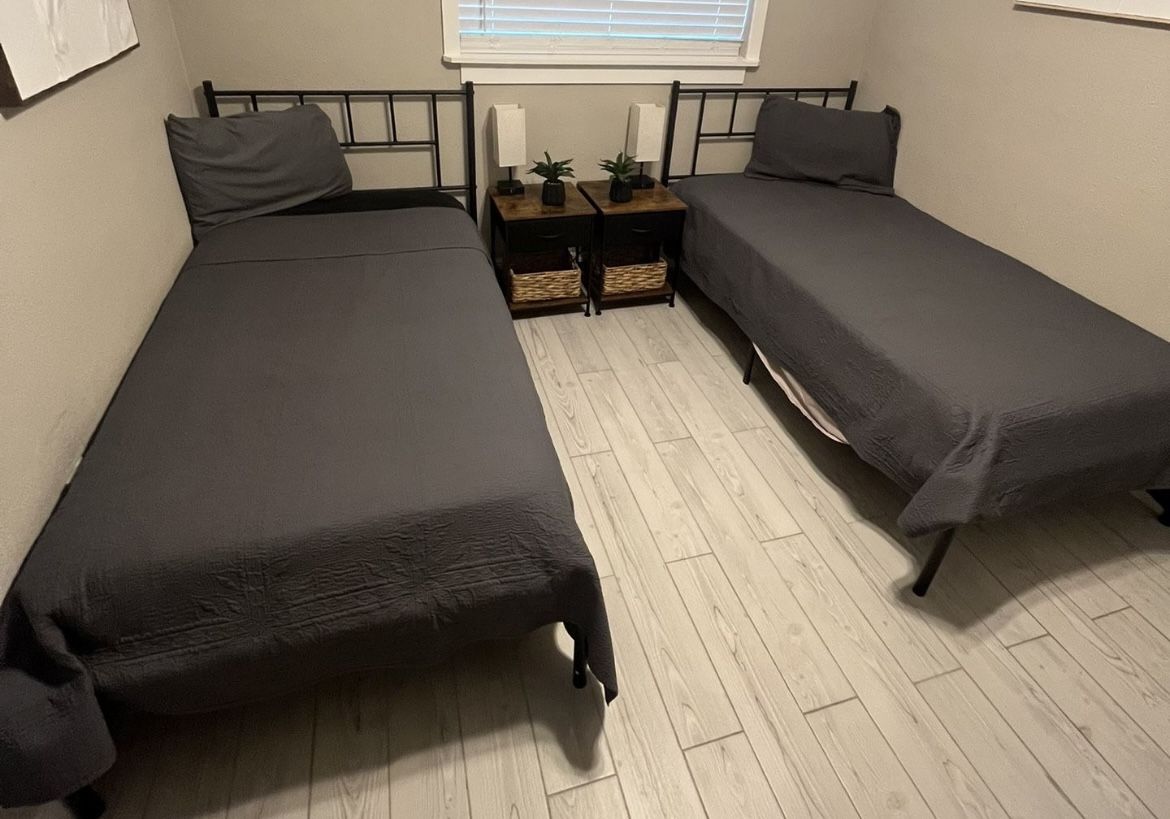 Twin Bed  Frame and 8” Mattress  $100  