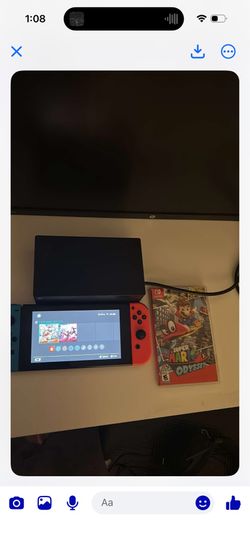 Nintendo Switch + Dock + Super Mario Odyssey – Great Condition