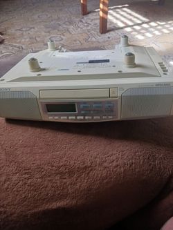 Under the cabinet AM FM stereo CD player and clock