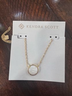 Kendra Scott necklaces are brand new and available for $40 each, or 3 for just $100! And a pair of letter “J” Kendra Scott earrings are $30.