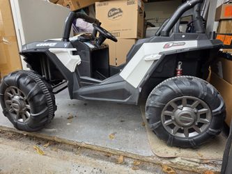 Kid Utv, New Battery. Comes With Charger, Not Remote Controler 
