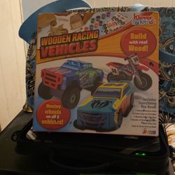 Wooden Racing Vehicles That You Build, Paint and Play With.