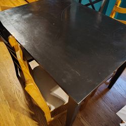 Black dining room table with 4 chairs