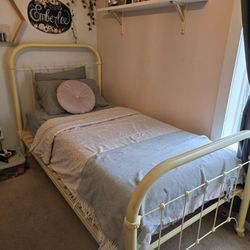 Two Antique Yellow Metal Twin Bed Frames