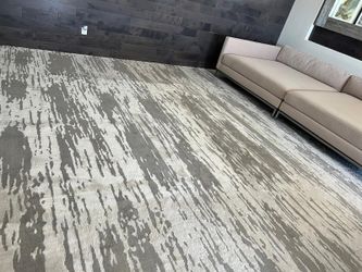 Two Grey and White Carpets
