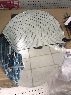 Delta oval tilting mirror