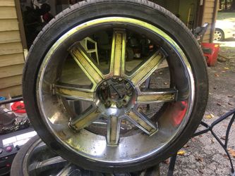 Four wheels and tires One good tire wheel size 2 6535R 22