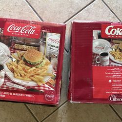 Two unopened sets of Coca Cola Dinner set of 4 per box