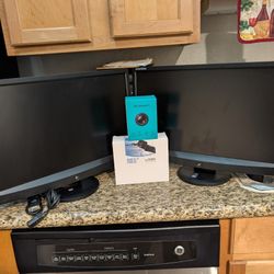 Computer Monitors And Two Keyboards