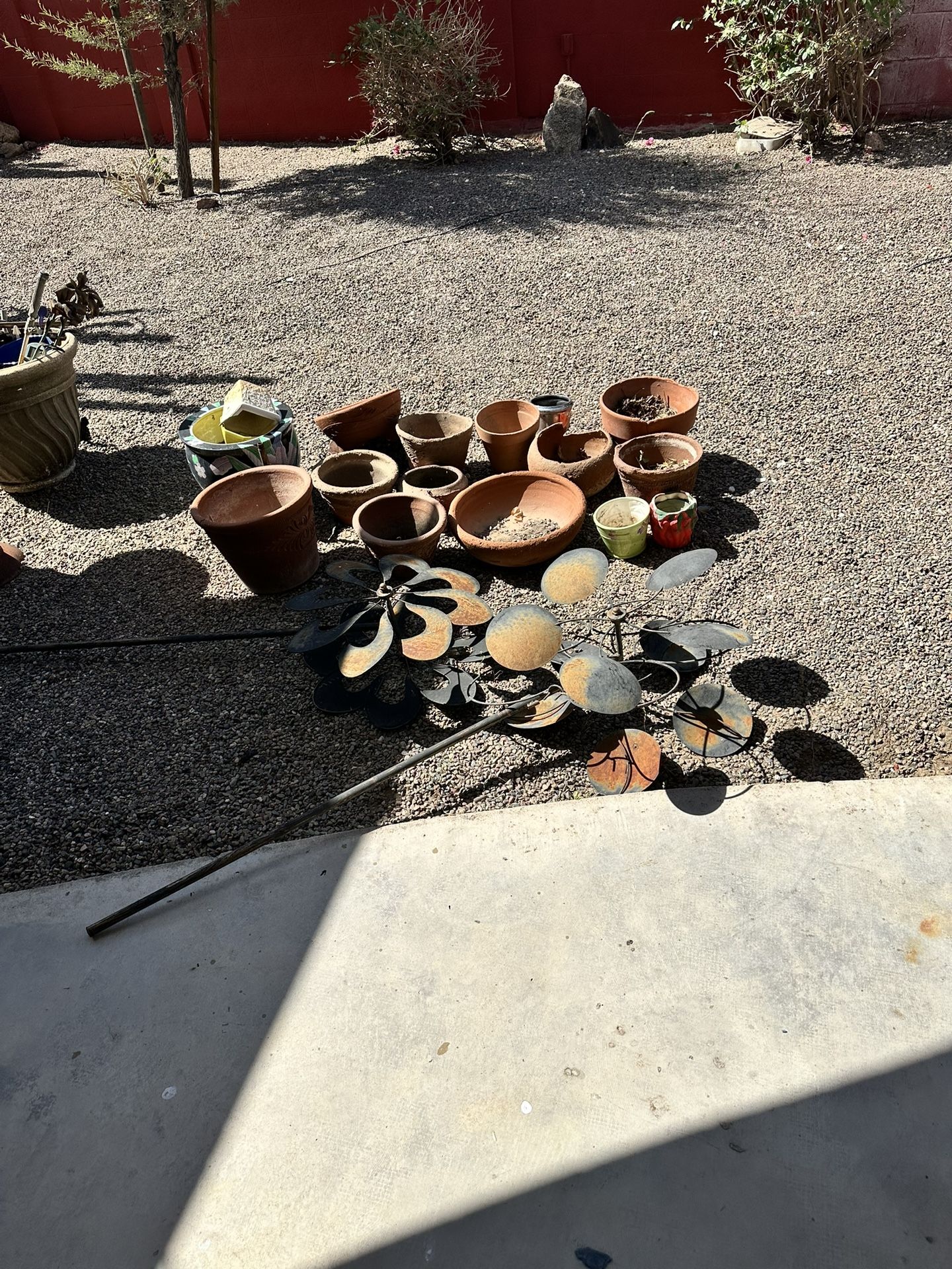 13 Clay Pots 2 Metal Windmills And Throwing In Other Plant Pots