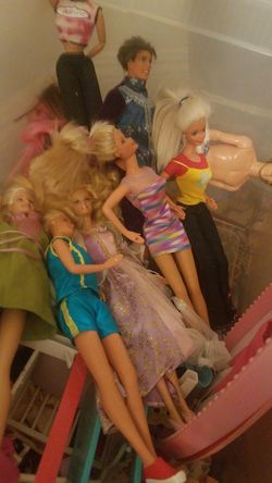10 plus barbies with lots of accessories one box full