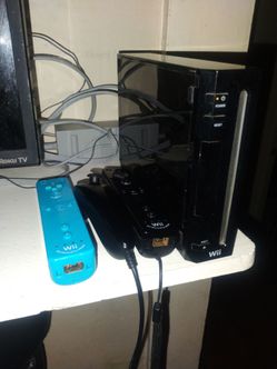 Nintendo wii + Mario kart & much more