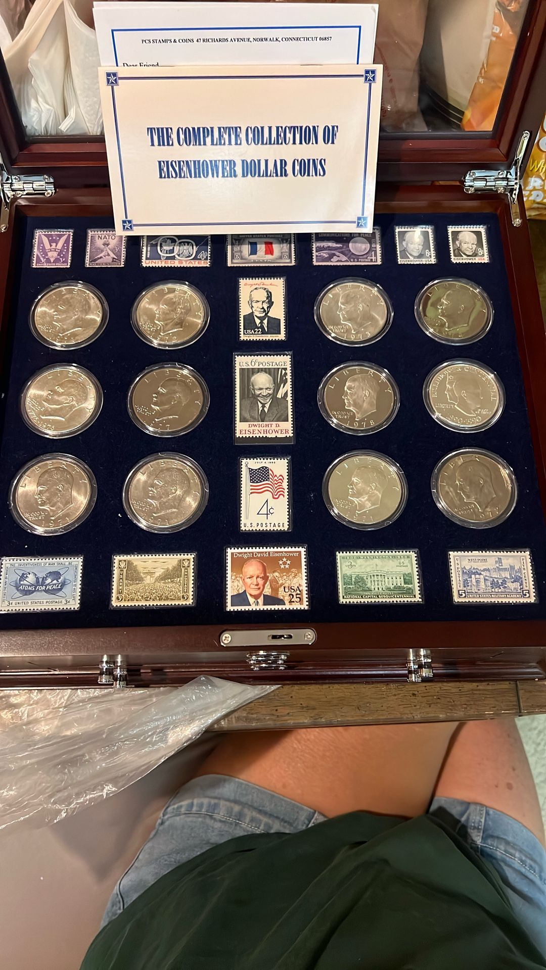 The complete collection of Eisenhower dollar coins in Mahogany box