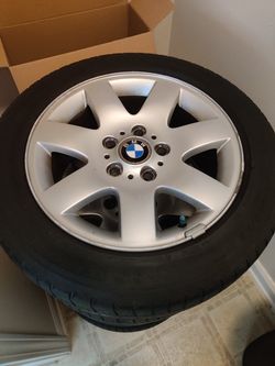 Set of 4 BMW 325i wheels and tires