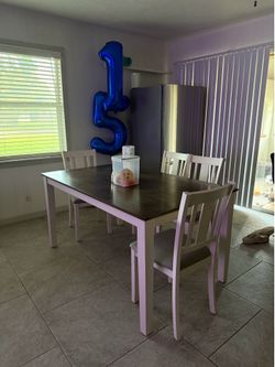 Table and four chairs