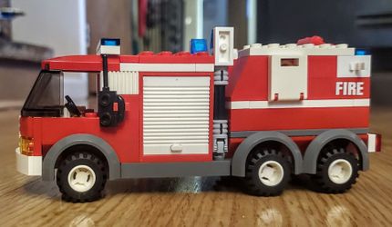 Lego City off road fire rescue 7942 plus additional fire truck and trailer.