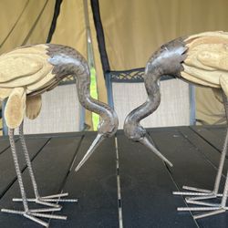 Herons made of metal and wood