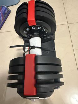 BRAND NEW 52.5lb adjustable dumbells