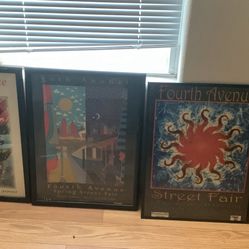 Four framed 4th Ave., Street fair posters. These measure 18 inches wide 24 inches tall.