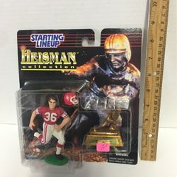 Steve Owens figurine and trophy