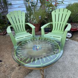 Heavy duty, glass and metal sun, coffee table with Adirondack chairs