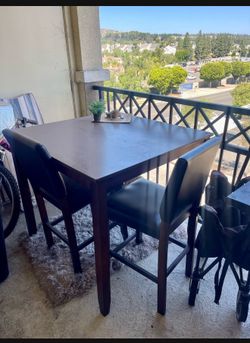 Dining table with 4  leather chairs